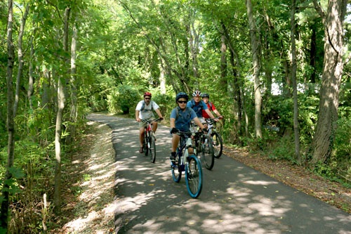 People biking on Huckleberry Trail