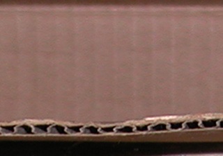 A photograph of corrugated cardboard.