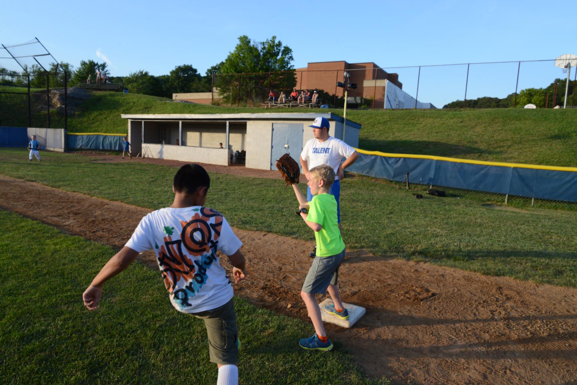 Runner running to base at baseball game