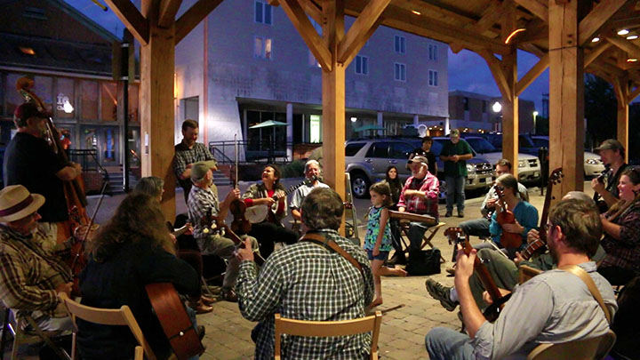 People playing instruments at Market Square Jam